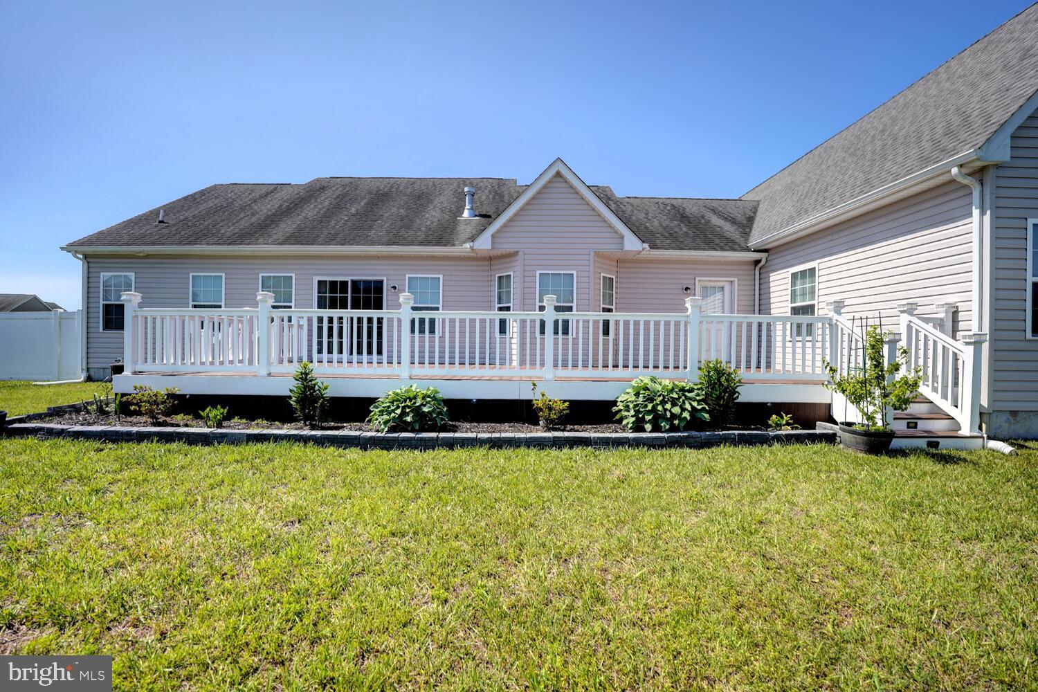 167 Spring Dale Lane Felton, DE 19943 - Photo 52 of 54 a view of a house with a yard and deck