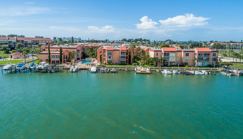 8901 Blind Pass Road, Unit 224 St. Pete Beach, FL 33706 - Photo 1 of 46 a view of a city with tall buildings