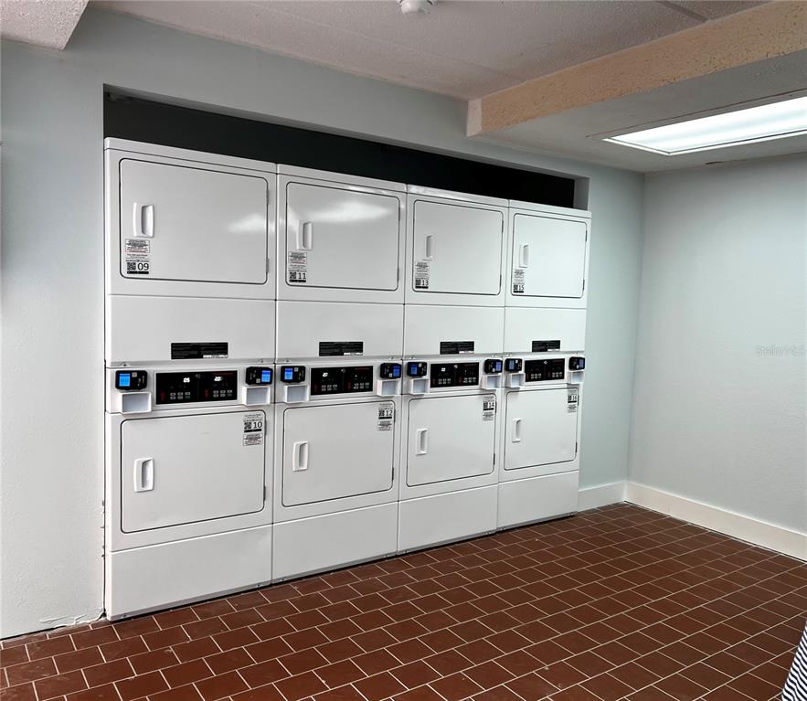 8901 Blind Pass Road, Unit 224 St. Pete Beach, FL 33706 - Photo 31 of 46 a view of white cabinets and window