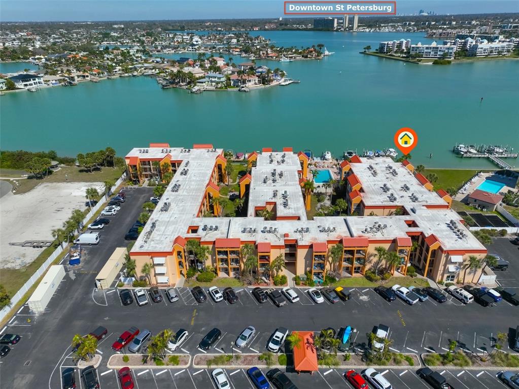 8901 Blind Pass Road, Unit 224 St. Pete Beach, FL 33706 - Photo 39 of 46 an aerial view of a houses with outdoor space