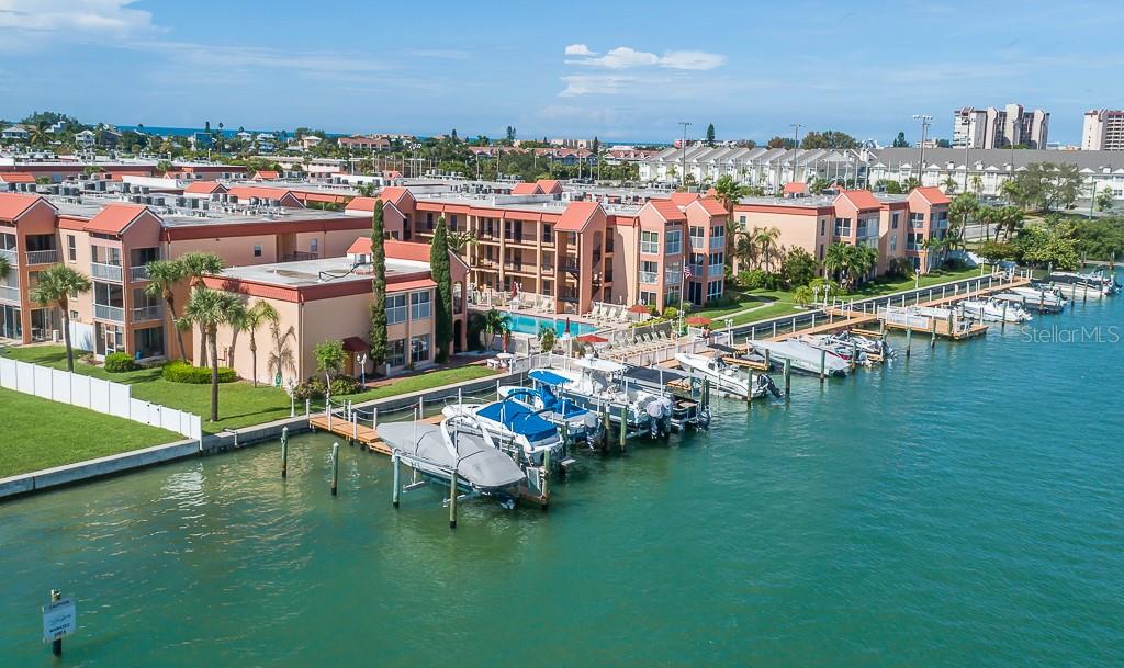 8901 Blind Pass Road, Unit 224 St. Pete Beach, FL 33706 - Photo 46 of 46 a view of a lake with tall buildings