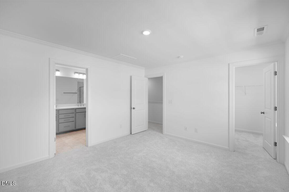 430 Rowe Way Knightdale, NC 27545 - Photo 18 of 51 a view of an empty room and closet