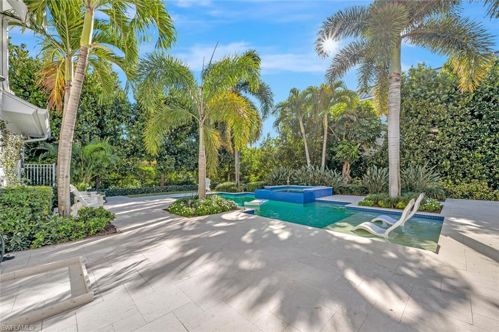 Undisclosed Address Naples, FL 34102 - Photo 37 of 44 a view of a park with large trees