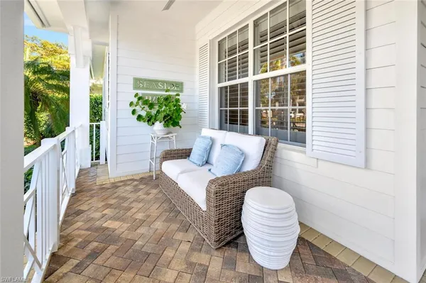 a view of a chair and table in a patio
