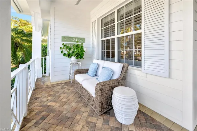 a view of a chair and table in a patio