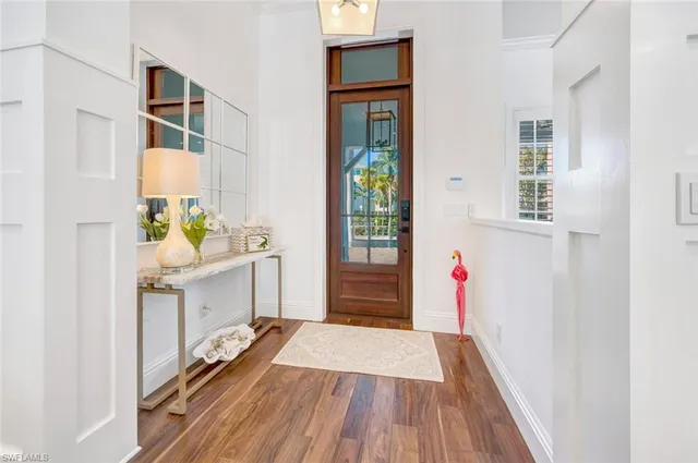 a view of kitchen with furniture and wooden floor