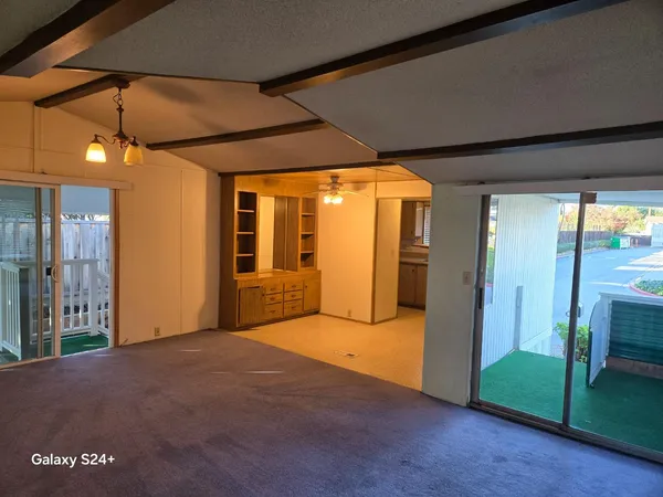 a view of a room with an empty space
