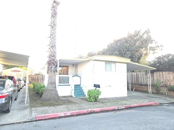 a front view of a house with a garage