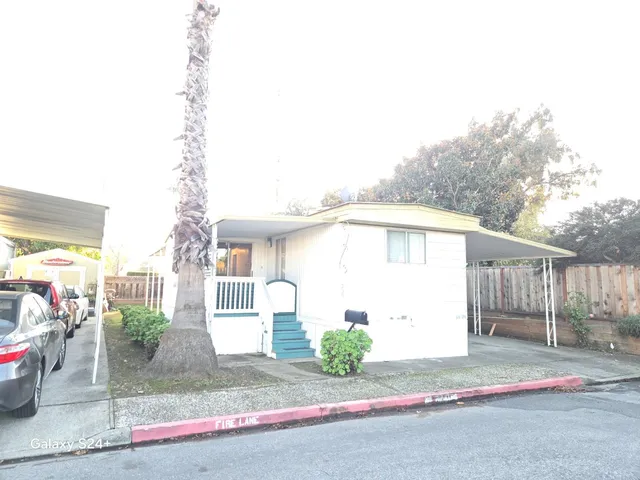 a front view of a house with a garage