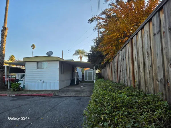 a view of a back yard of the house
