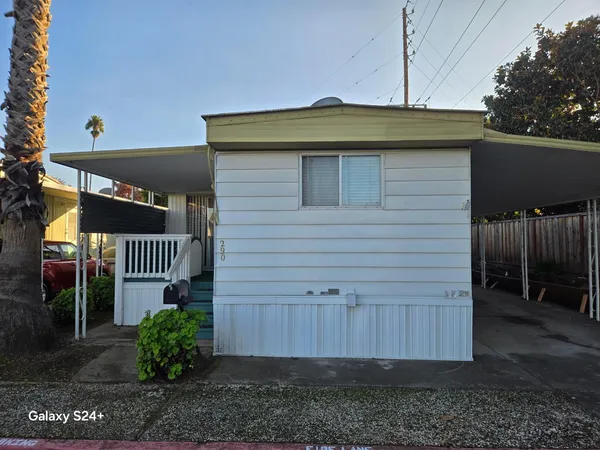 a front view of a house with a garage