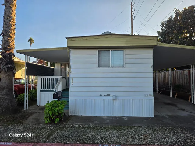 a front view of a house with a garage