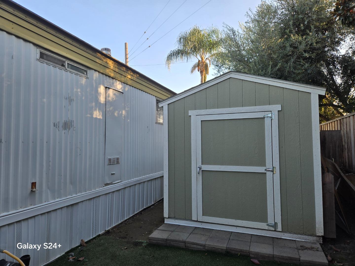 195 Blossom Hill Road, Unit 290 San Jose, CA 95123 - Photo 9 of 28 a front view of a house with a garage