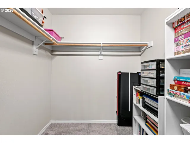 a bathroom with a toilet a sink and a mirror