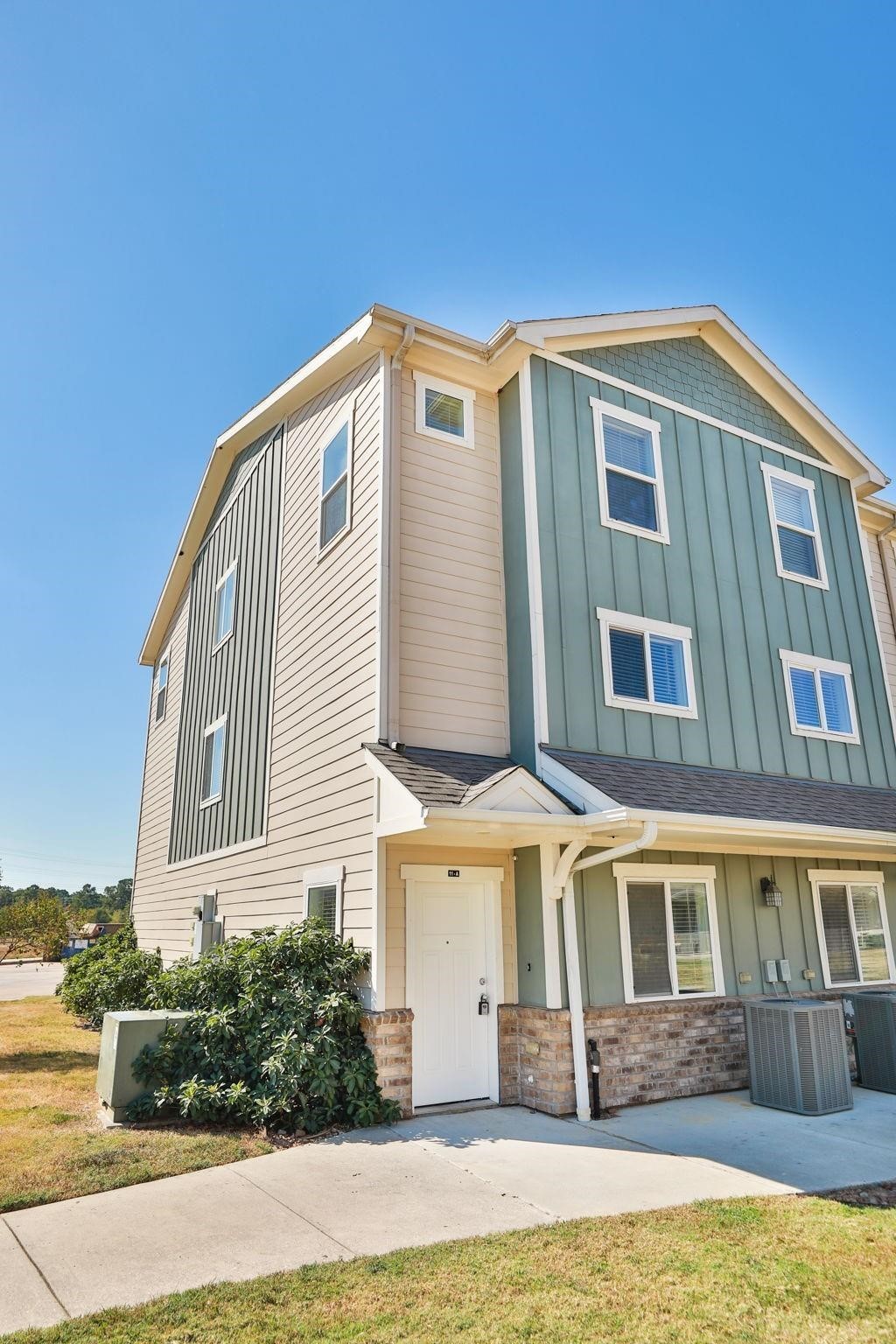 12603 Telge Road, Unit 27D Cypress, TX 77429 - Photo 2 of 27 a front view of a house with garden