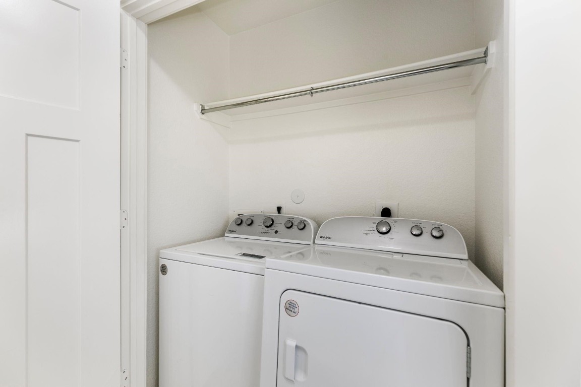 12603 Telge Road, Unit 27D Cypress, TX 77429 - Photo 21 of 27 a utility room with dryer and washer