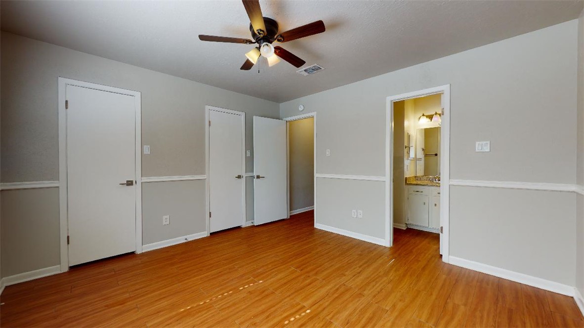 3923 Olive Street, Unit A Bryan, TX 77801 - Photo 20 of 27 a view of empty room with wooden floor