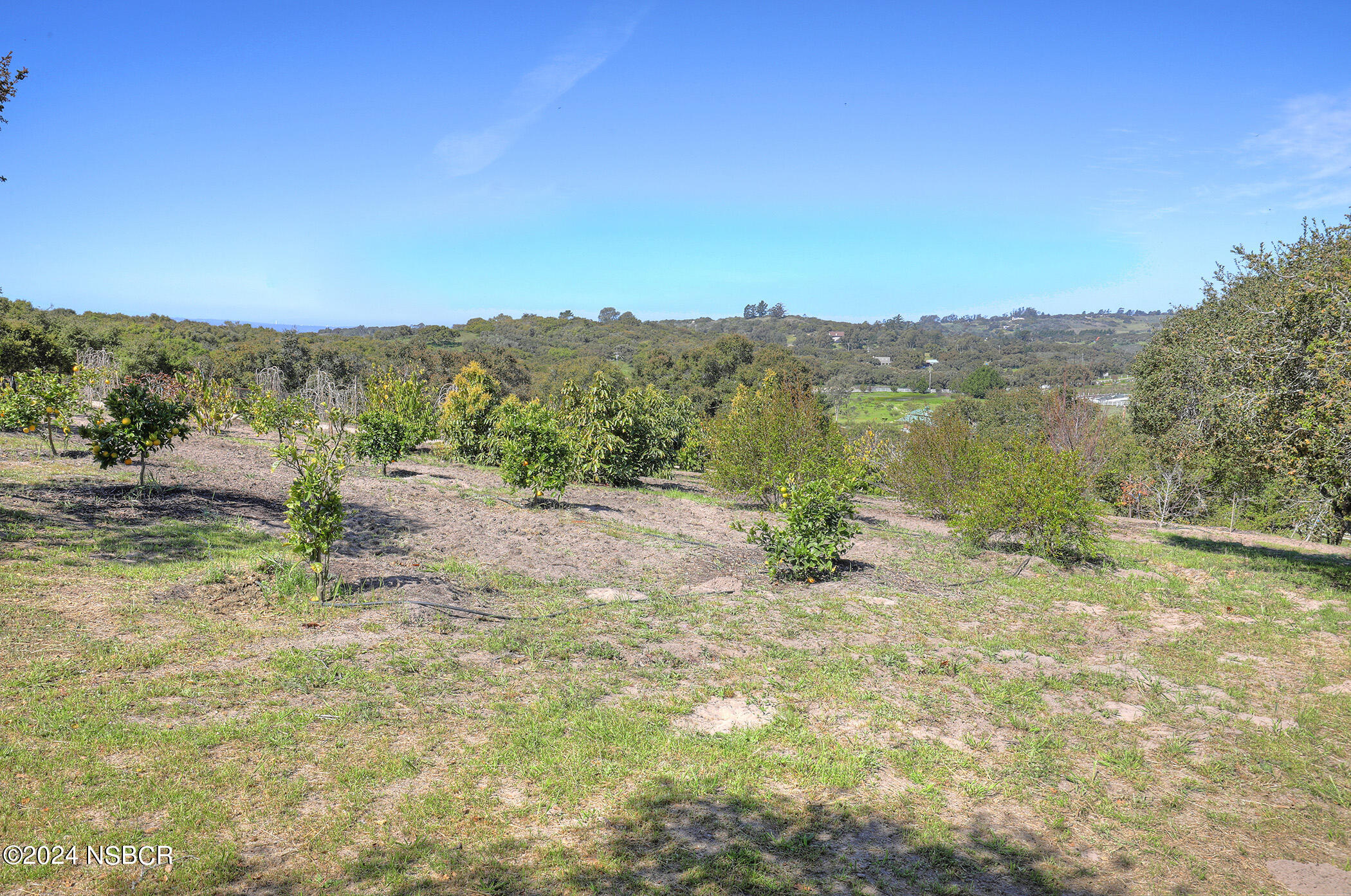 2191 Tularosa Road Lompoc, CA 93436 - Photo 24 of 67 a view of a lake with mountains in the background