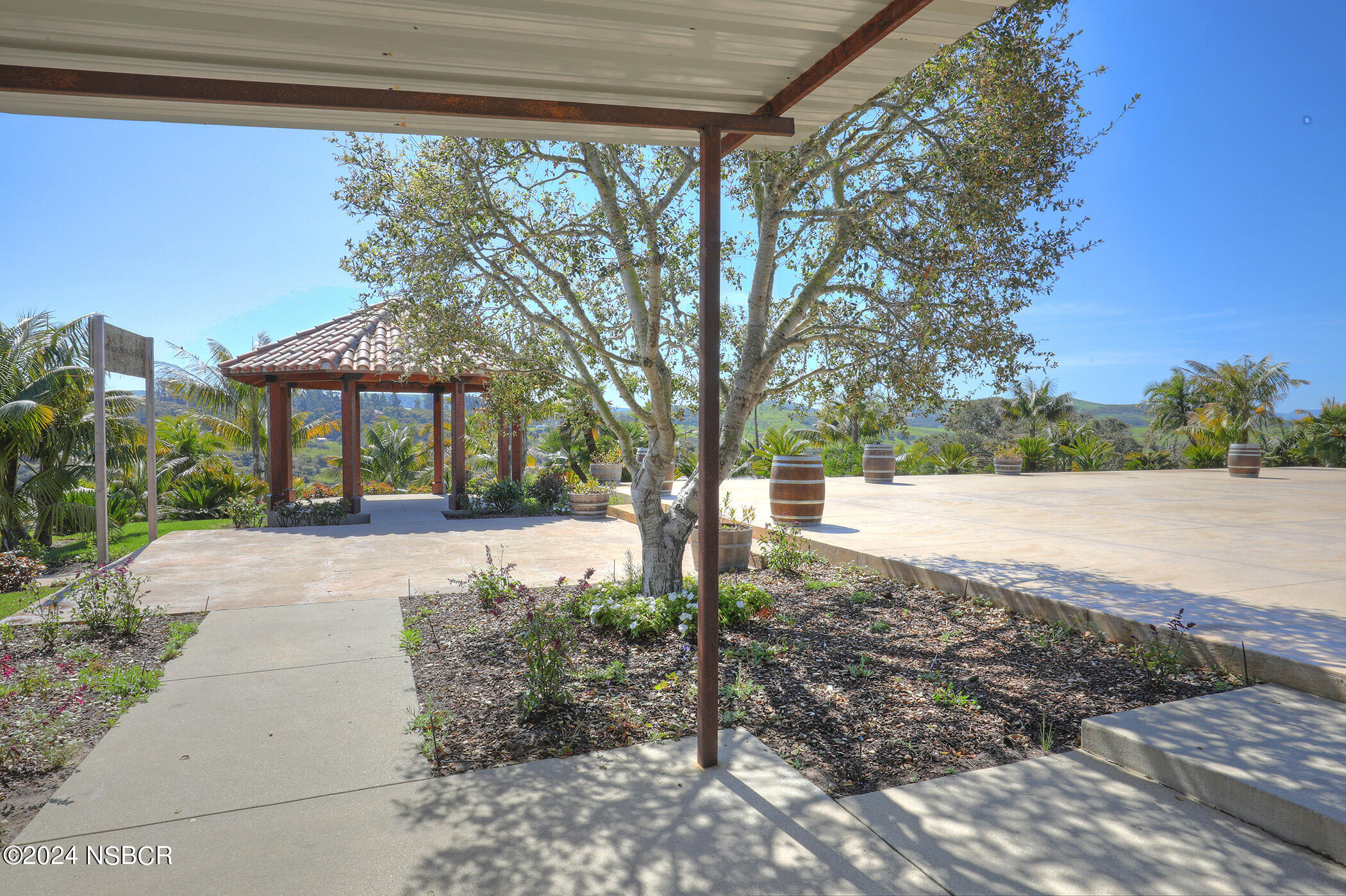 2191 Tularosa Road Lompoc, CA 93436 - Photo 36 of 67 a view of a house with backyard and trees