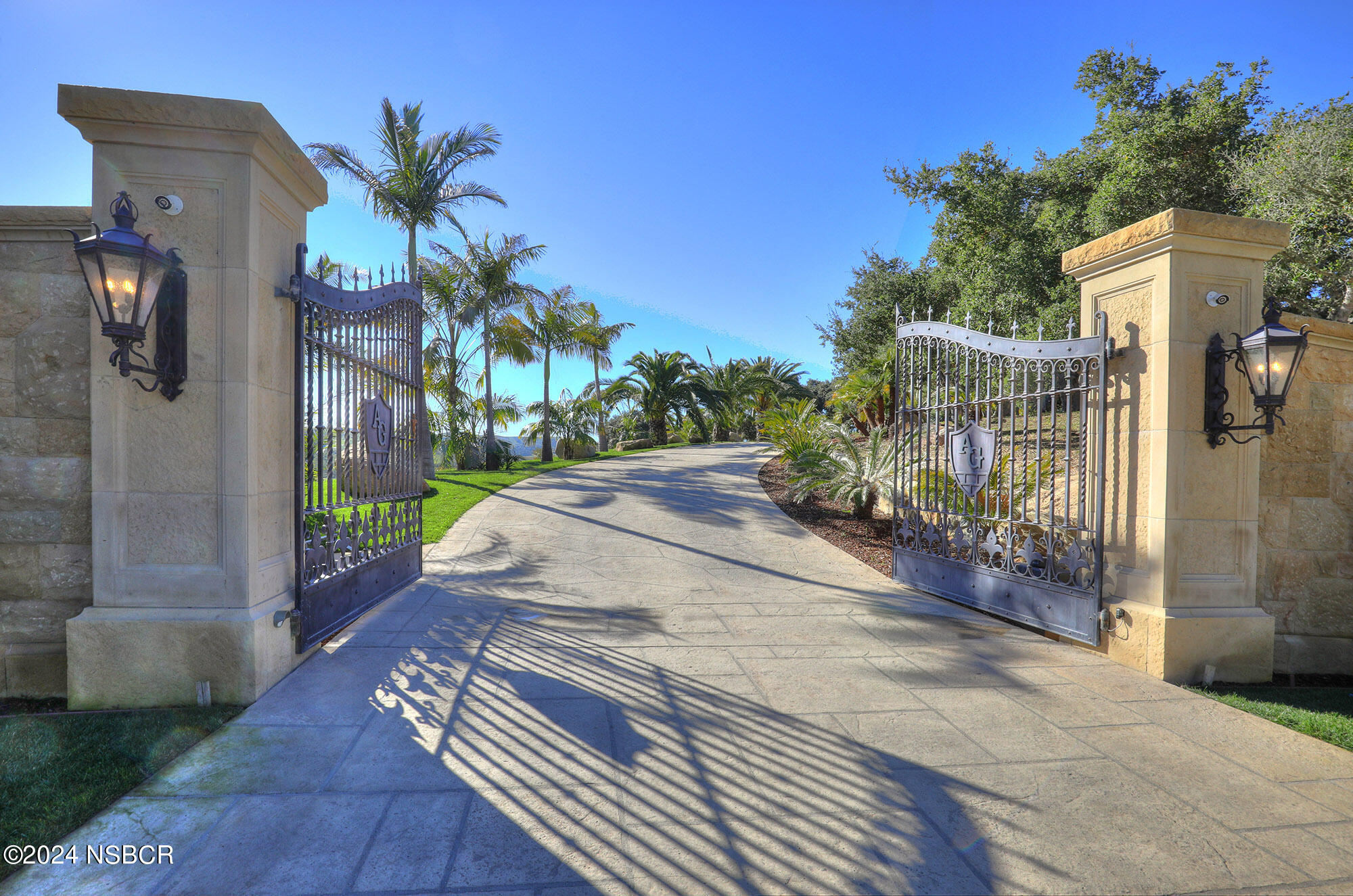 2191 Tularosa Road Lompoc, CA 93436 - Photo 4 of 67 a view of a street with potted plants