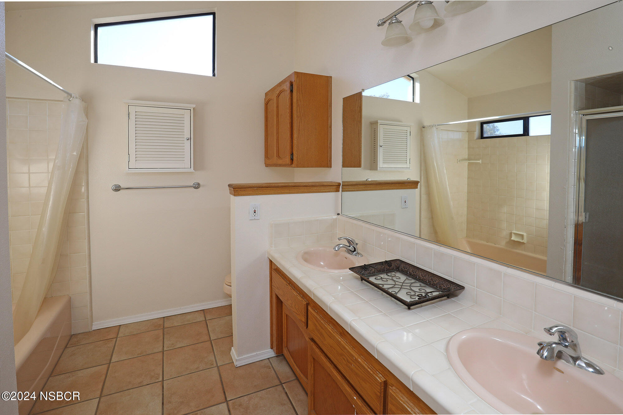 2191 Tularosa Road Lompoc, CA 93436 - Photo 48 of 67 a bathroom with a sink and a mirror
