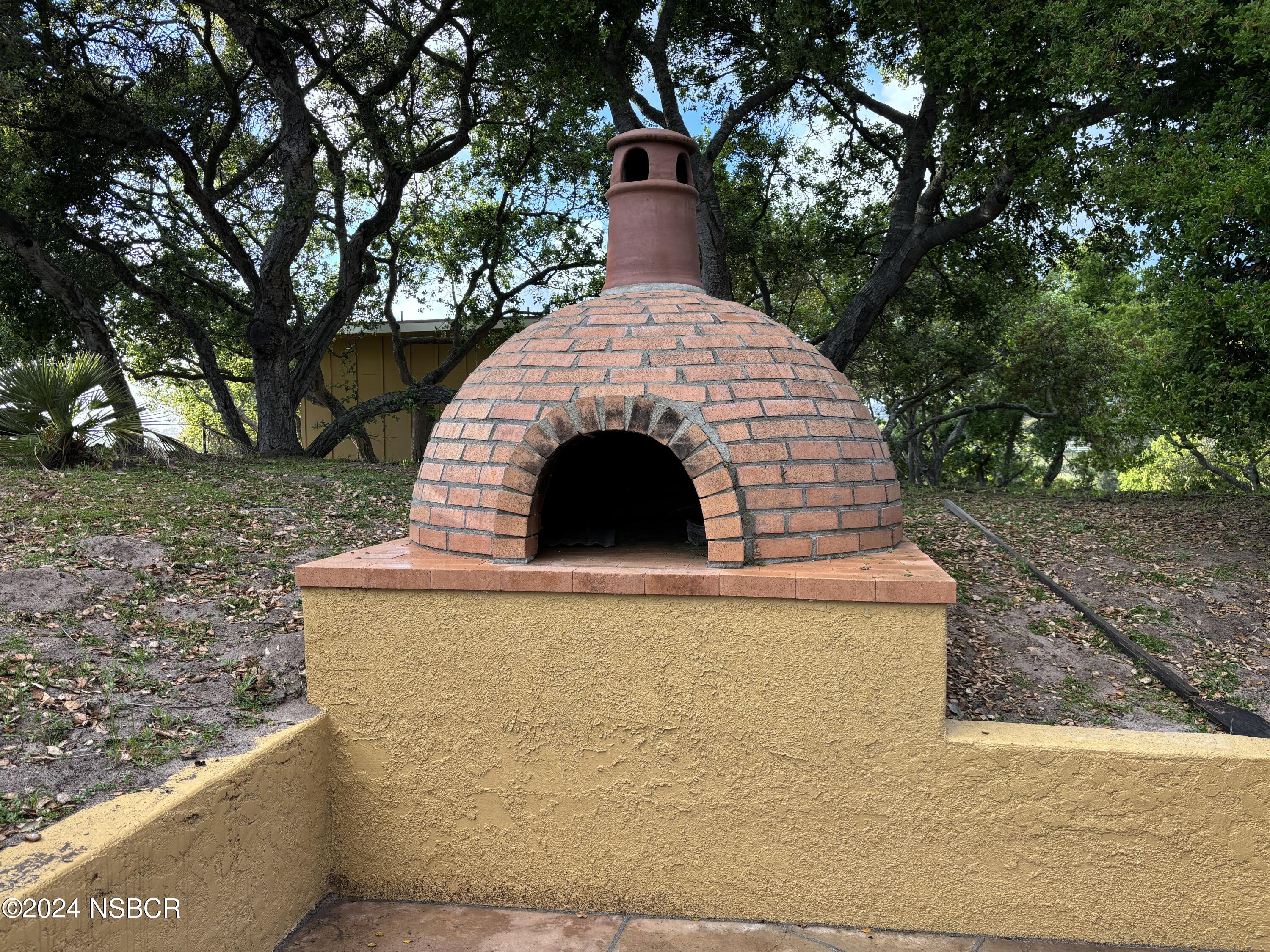 2191 Tularosa Road Lompoc, CA 93436 - Photo 61 of 67 a front view of a house with a yard