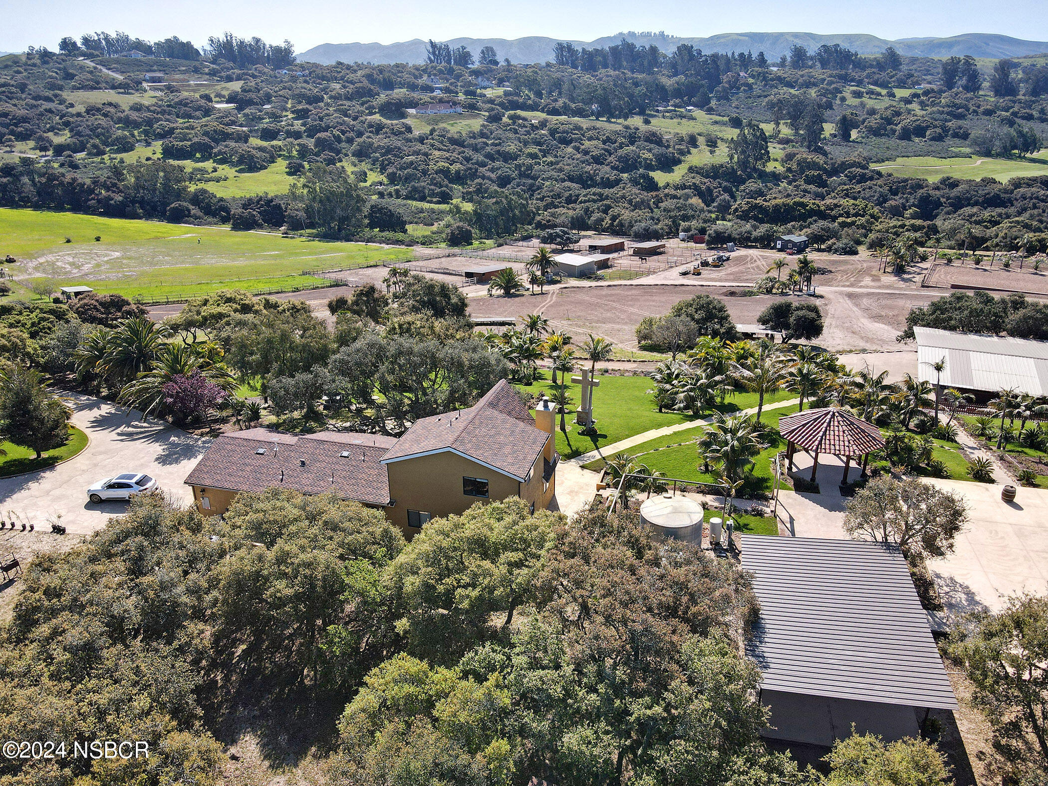 2191 Tularosa Road Lompoc, CA 93436 - Photo 7 of 67 an aerial view of a house with a garden and mountains view