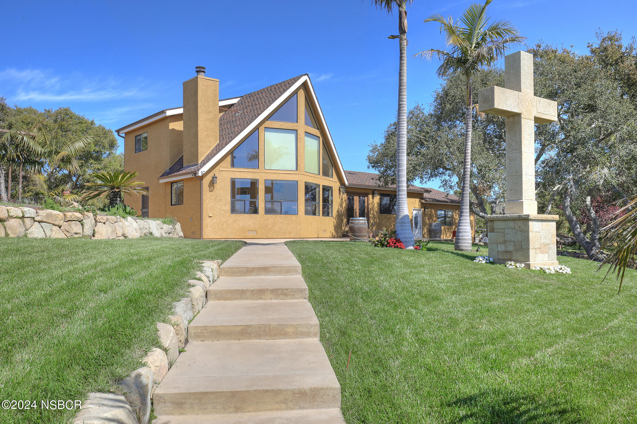 2191 Tularosa Road Lompoc, CA 93436 - Photo 10 of 67 a front view of a house with a yard