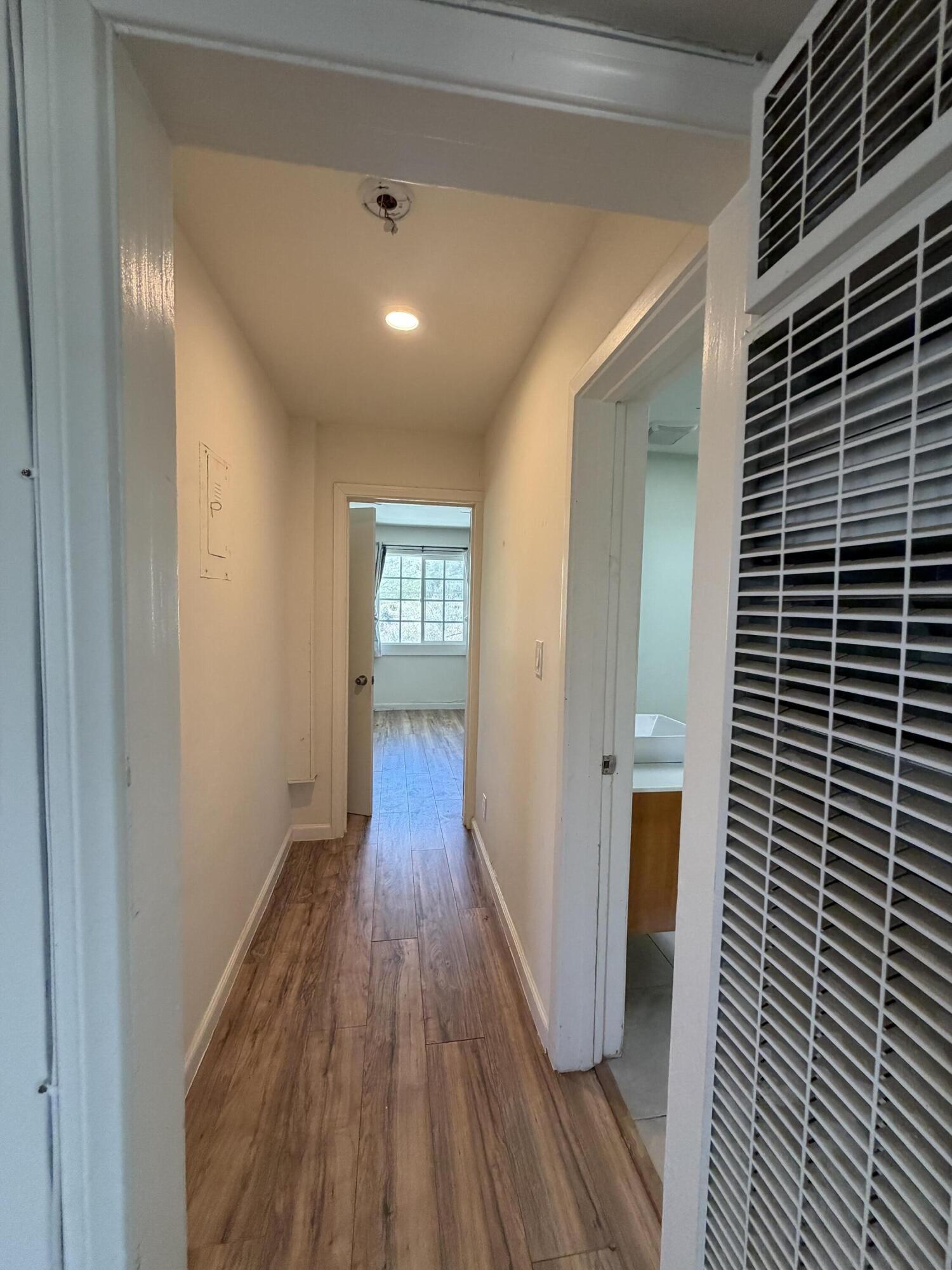 50988 Canyon Road Morongo Valley, CA 92256 - Photo 27 of 68 a view of hallway with wooden floor