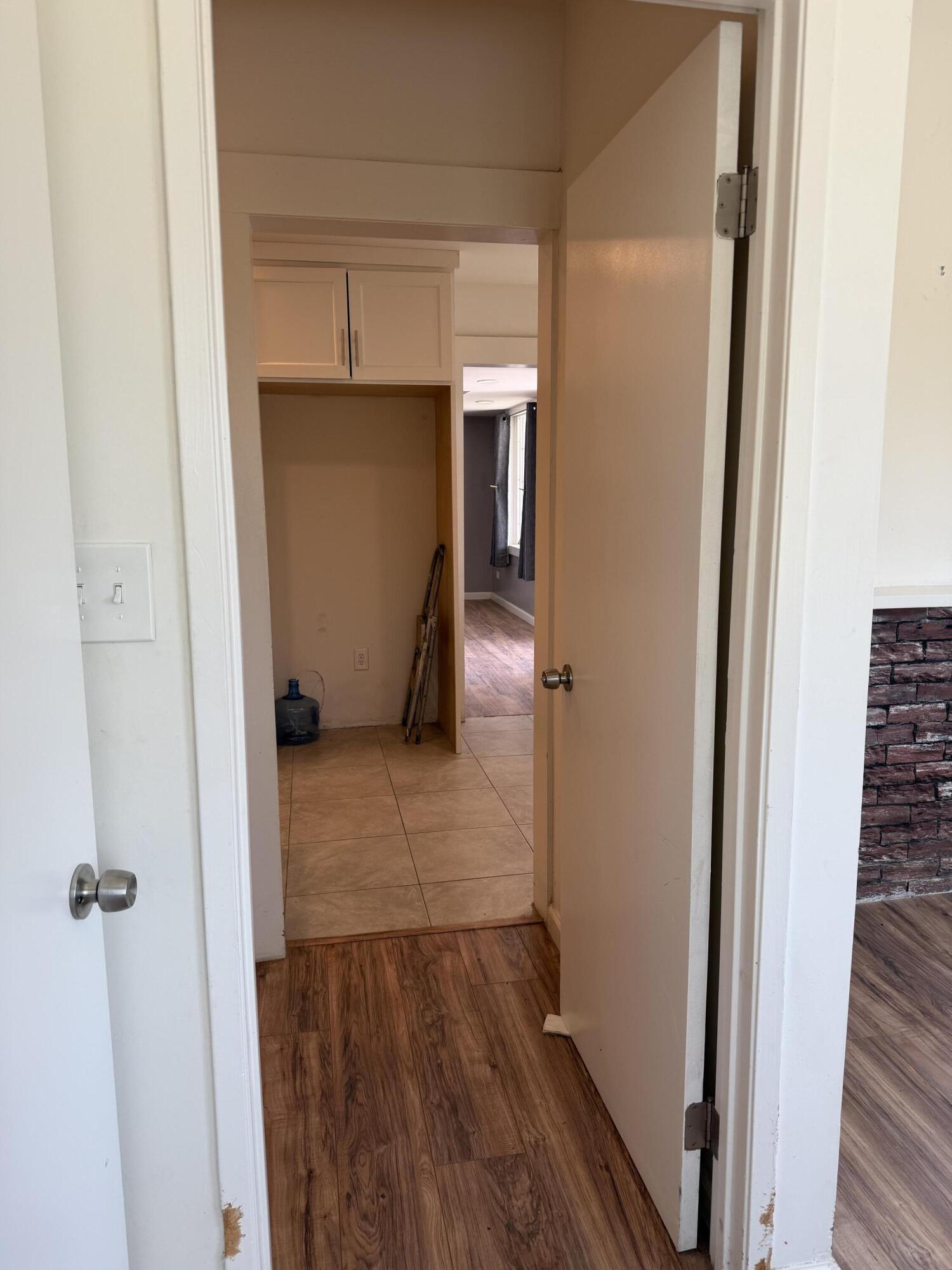 50988 Canyon Road Morongo Valley, CA 92256 - Photo 38 of 68 a view of walk in closet with wooden floor