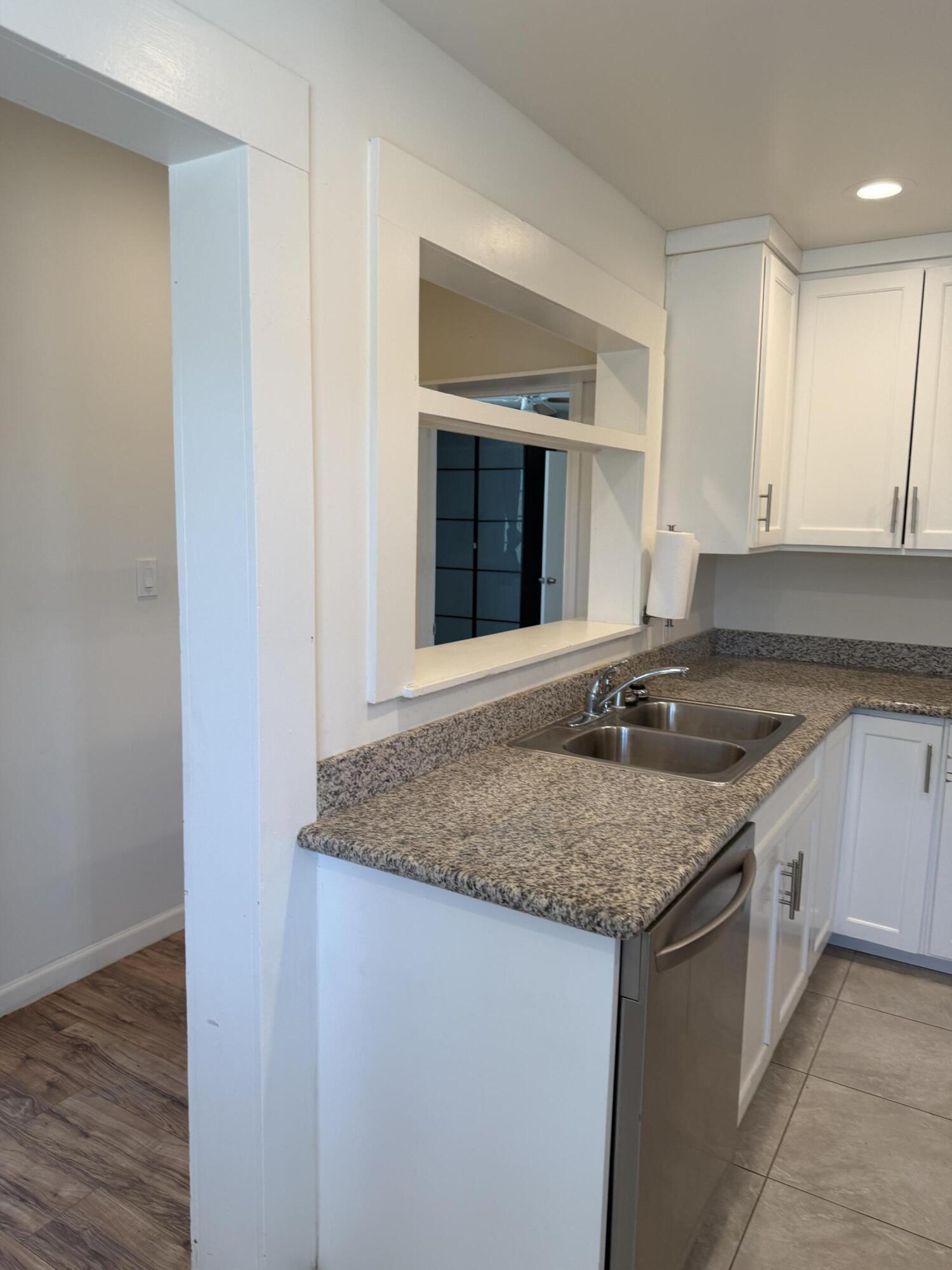 50988 Canyon Road Morongo Valley, CA 92256 - Photo 39 of 68 a kitchen with a sink and cabinets