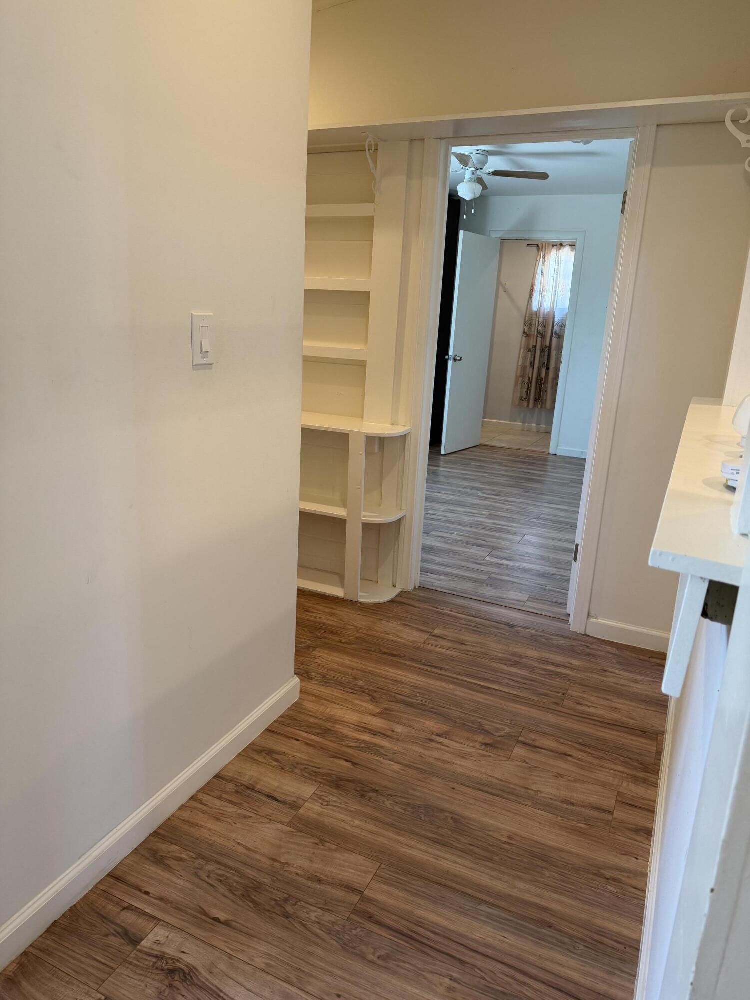 50988 Canyon Road Morongo Valley, CA 92256 - Photo 44 of 68 a view of a room with wooden floors and led lights