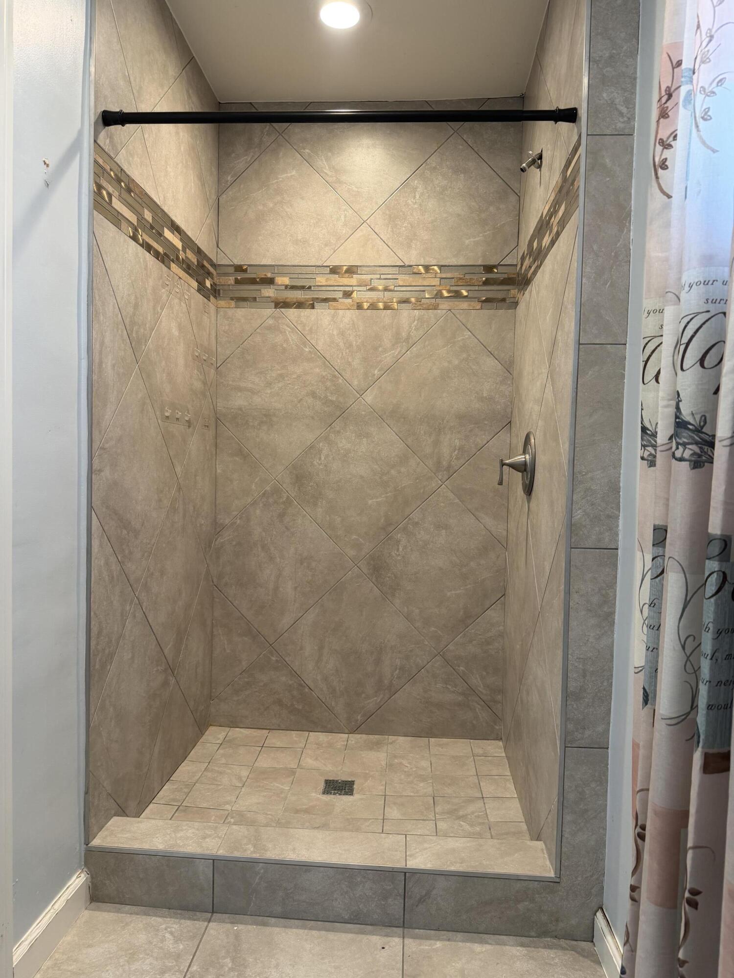 50988 Canyon Road Morongo Valley, CA 92256 - Photo 47 of 68 a bathroom with a shower