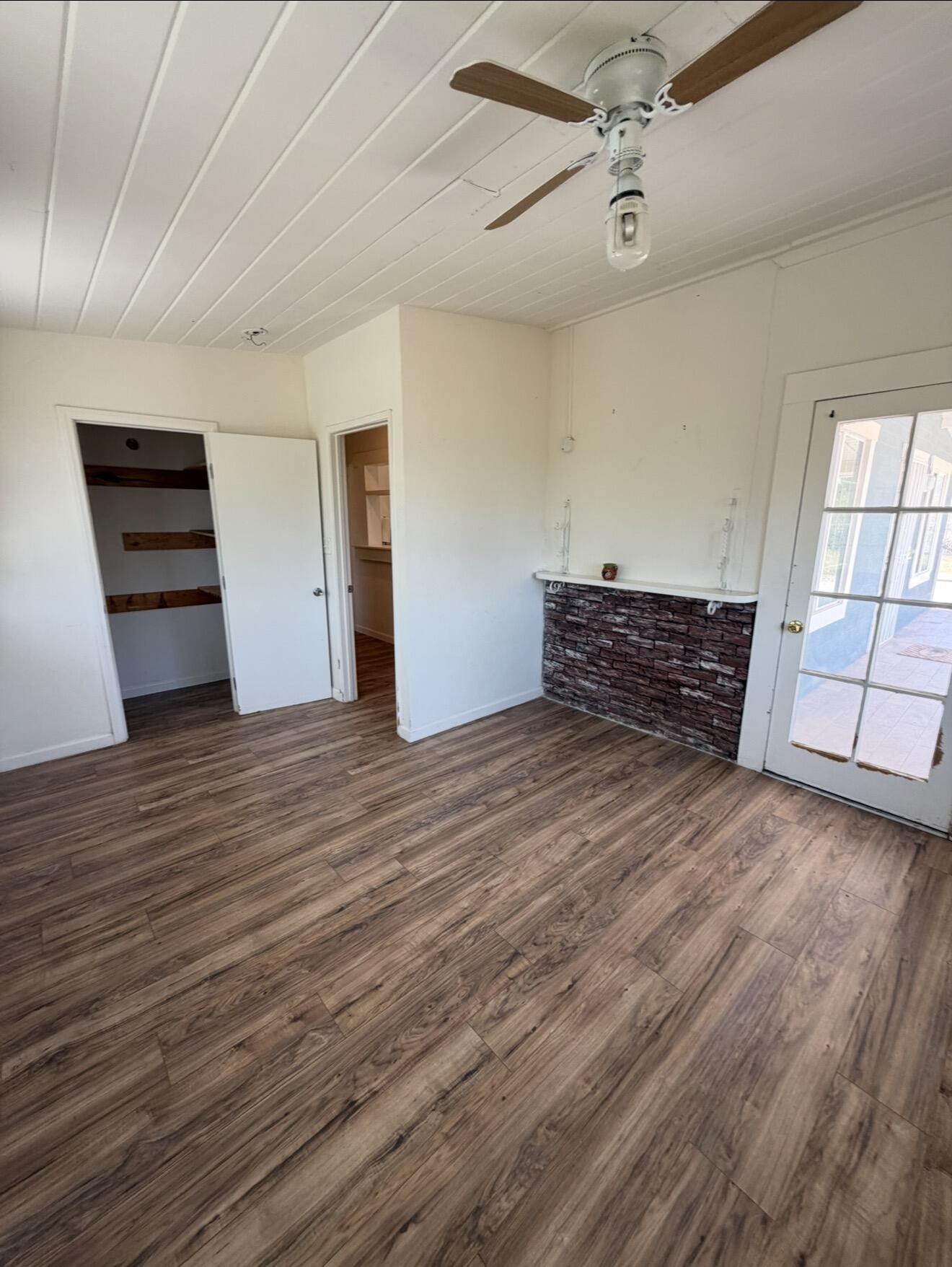 50988 Canyon Road Morongo Valley, CA 92256 - Photo 50 of 68 wooden floor in an empty room with a window