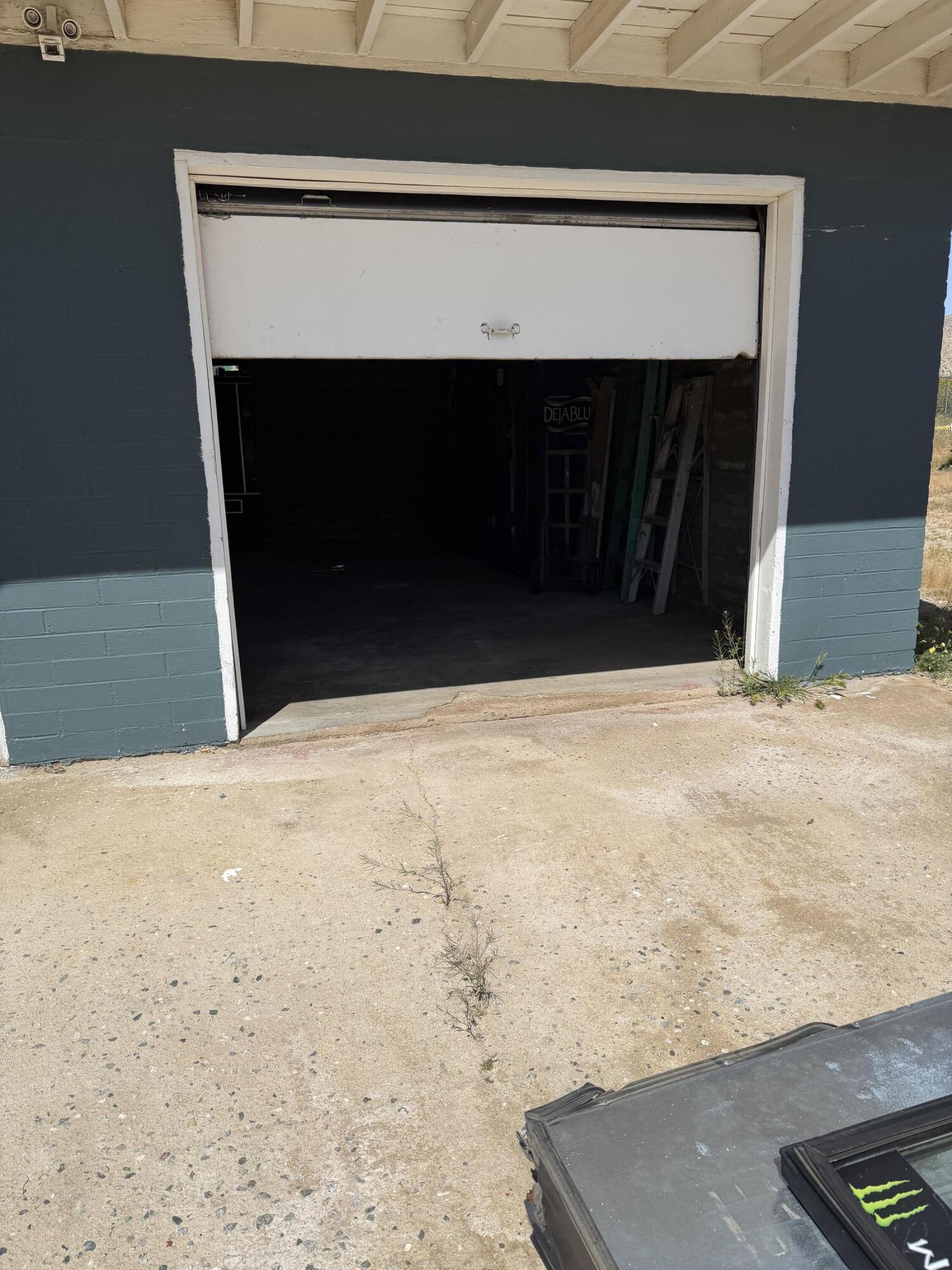 50988 Canyon Road Morongo Valley, CA 92256 - Photo 55 of 68 a view of garage with a fireplace
