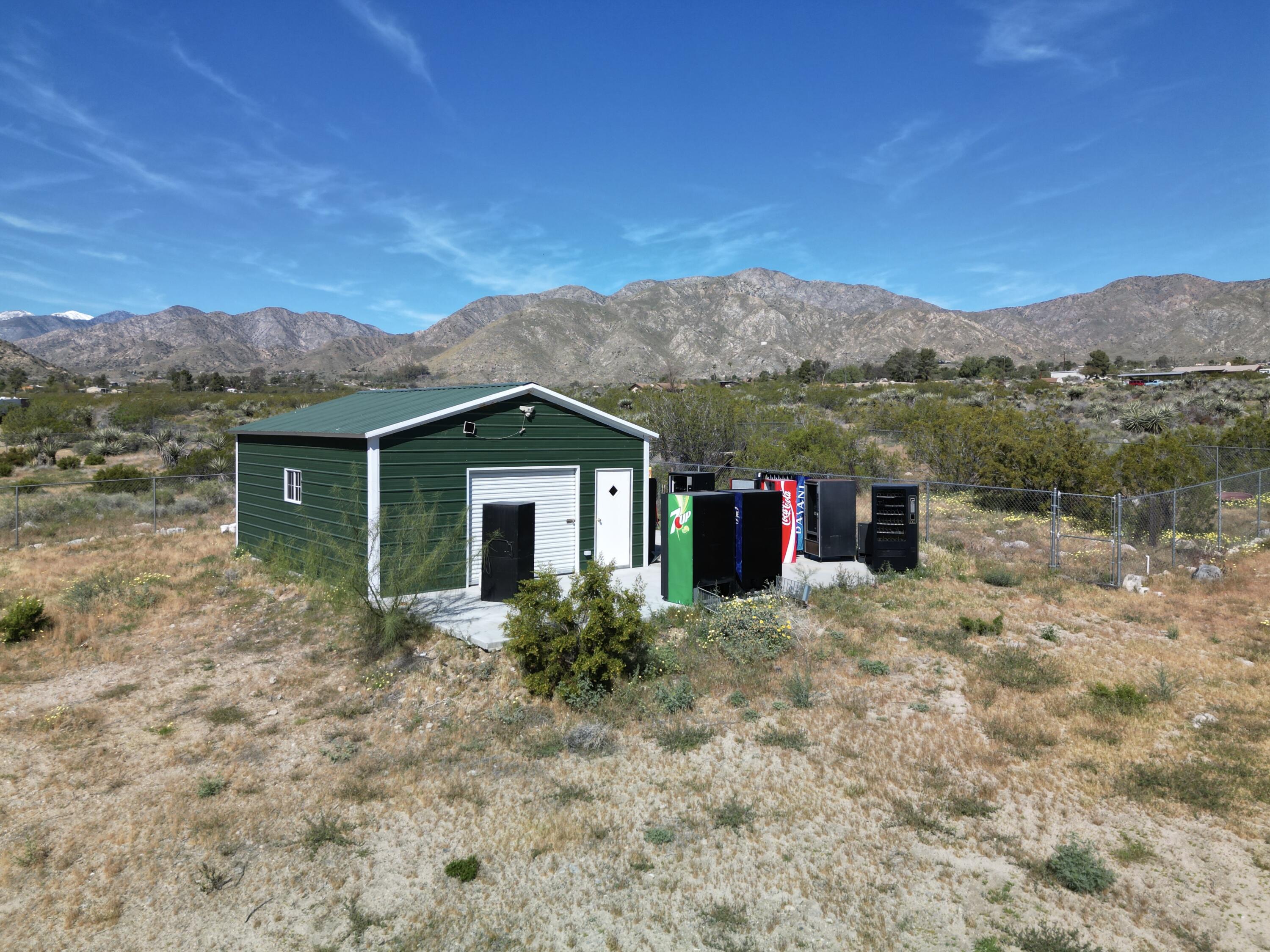 50988 Canyon Road Morongo Valley, CA 92256 - Photo 57 of 68 a front view of a house with a yard
