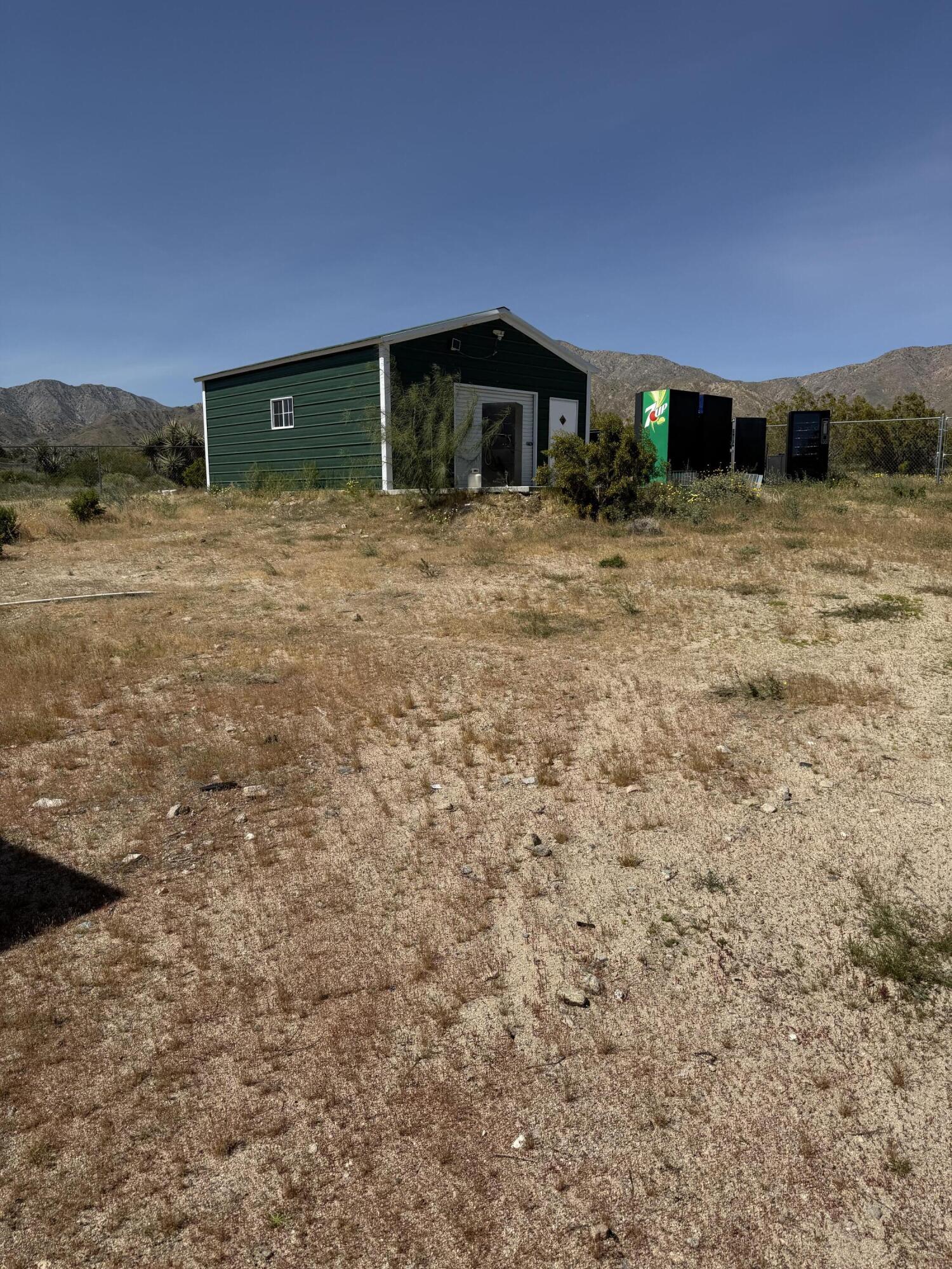 50988 Canyon Road Morongo Valley, CA 92256 - Photo 59 of 68 a front view of a house with a yard