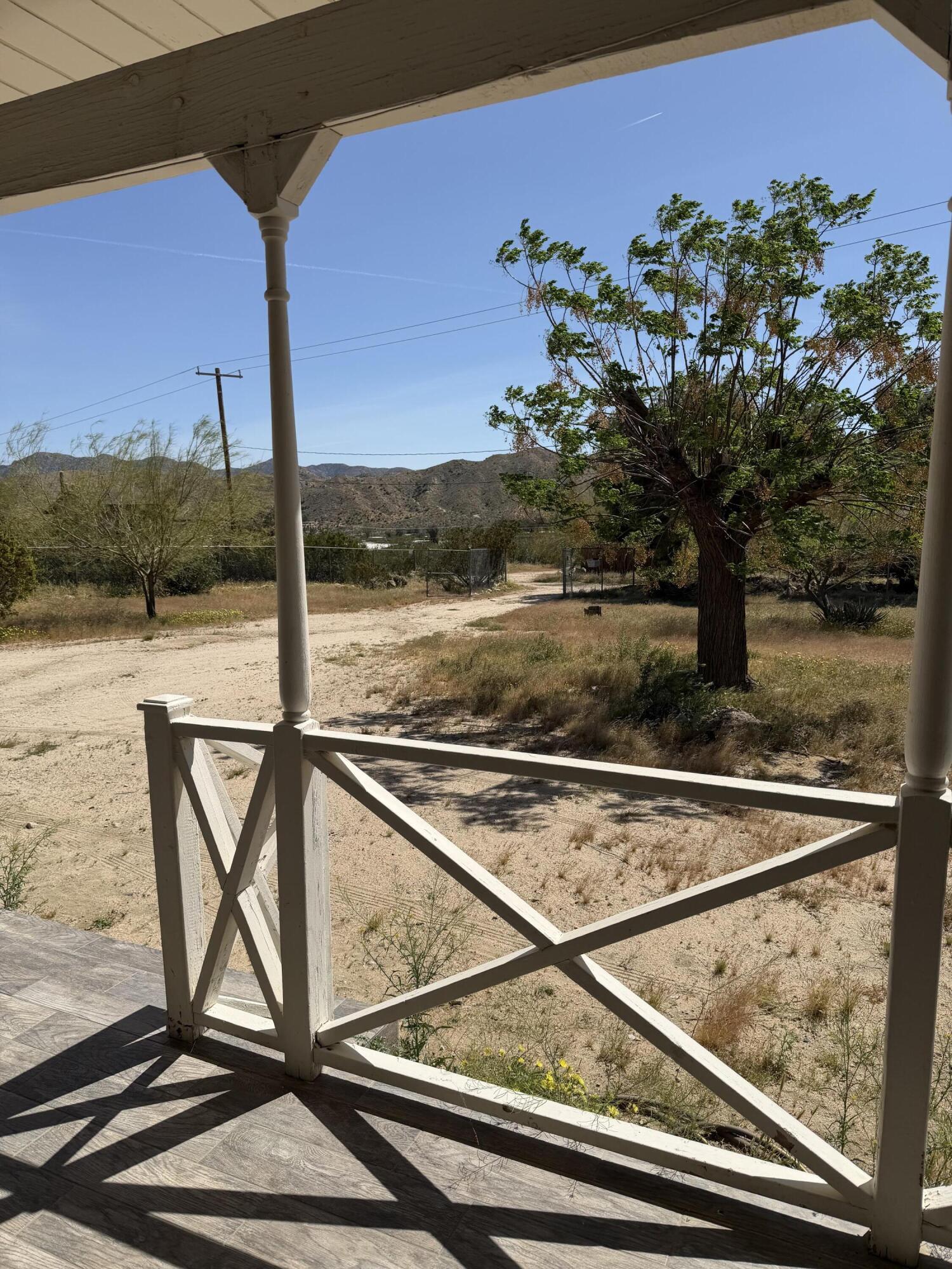 50988 Canyon Road Morongo Valley, CA 92256 - Photo 6 of 68 a view of swimming pool with a yard and mountain view