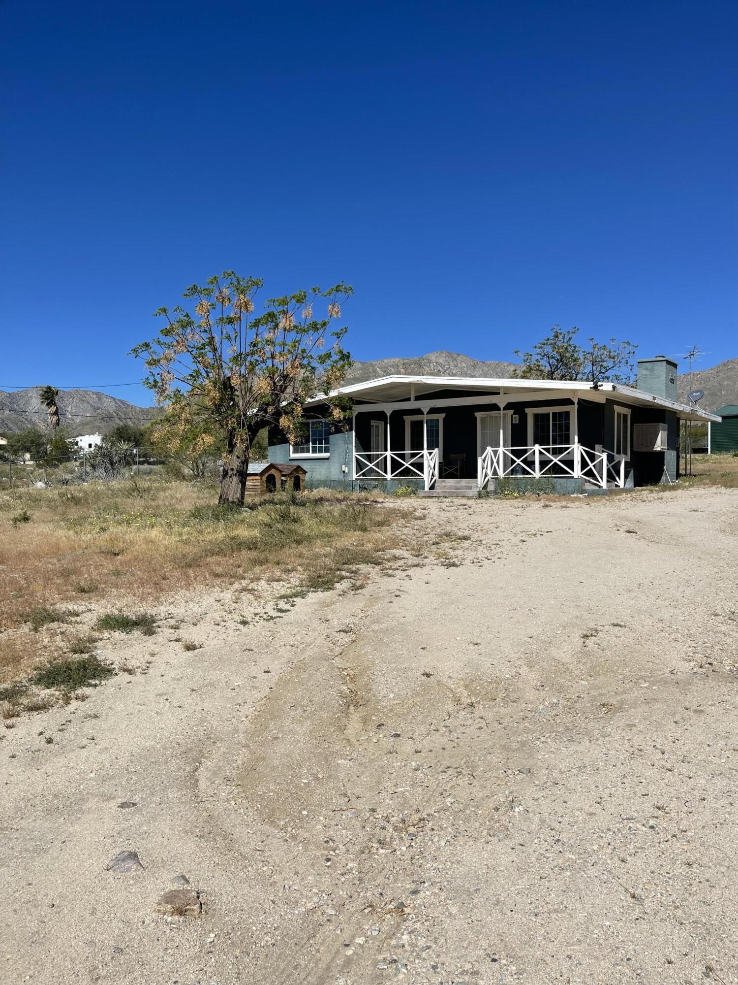 50988 Canyon Road Morongo Valley, CA 92256 - Photo 67 of 68 a view of a house with a yard