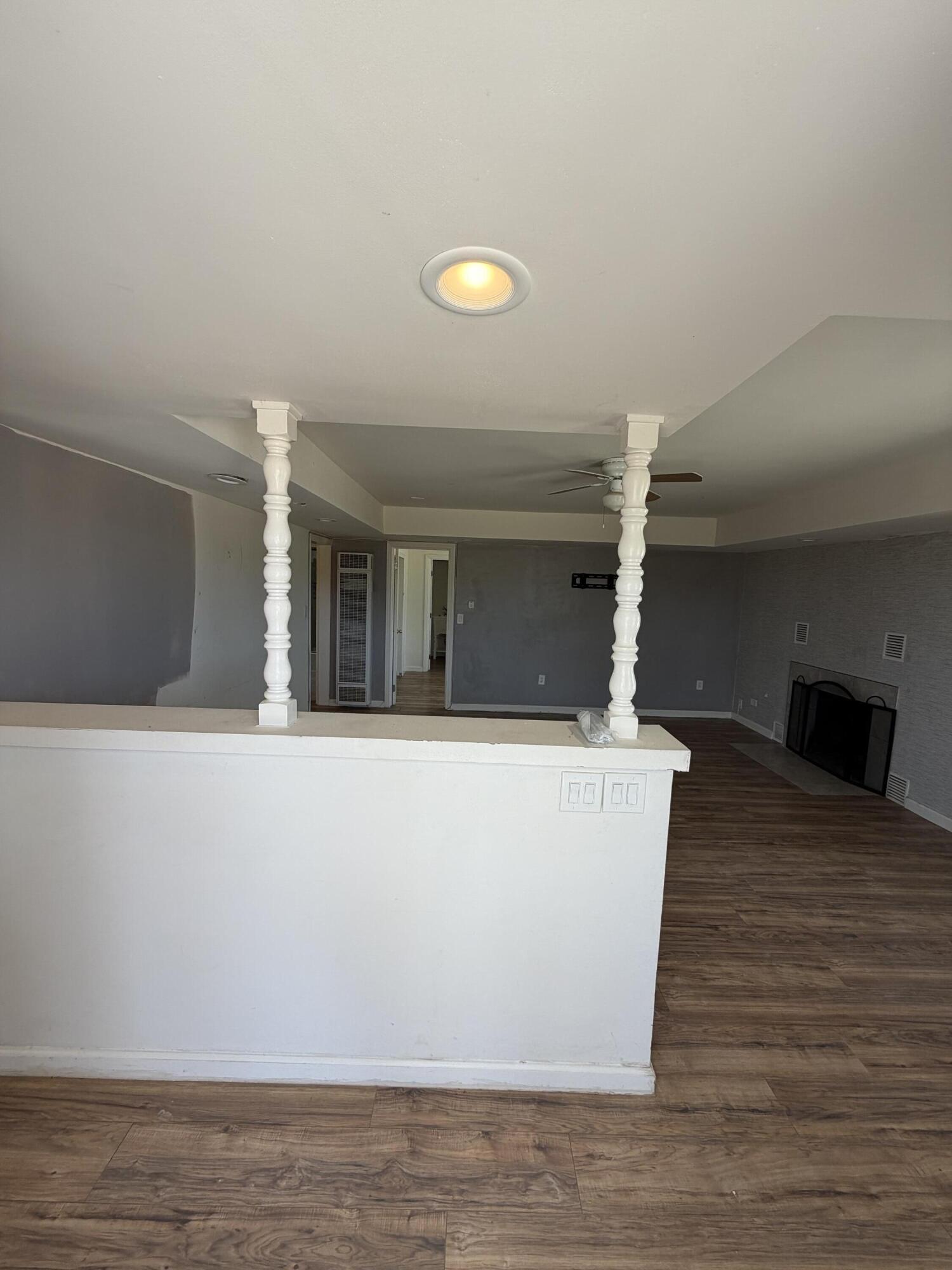 50988 Canyon Road Morongo Valley, CA 92256 - Photo 9 of 68 a view of a living room with wooden floor and a flat screen tv