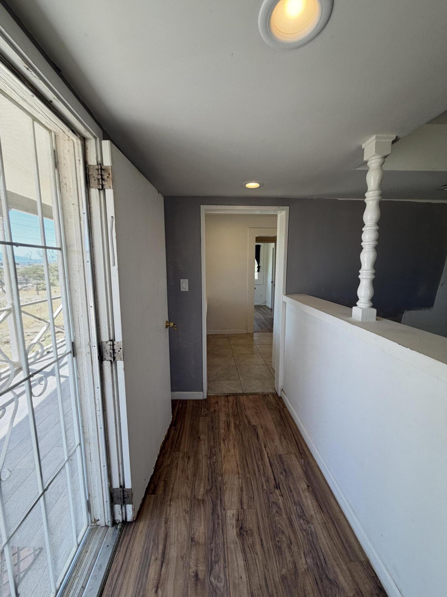50988 Canyon Road Morongo Valley, CA 92256 - Photo 10 of 68 a view of hallway with wooden floor