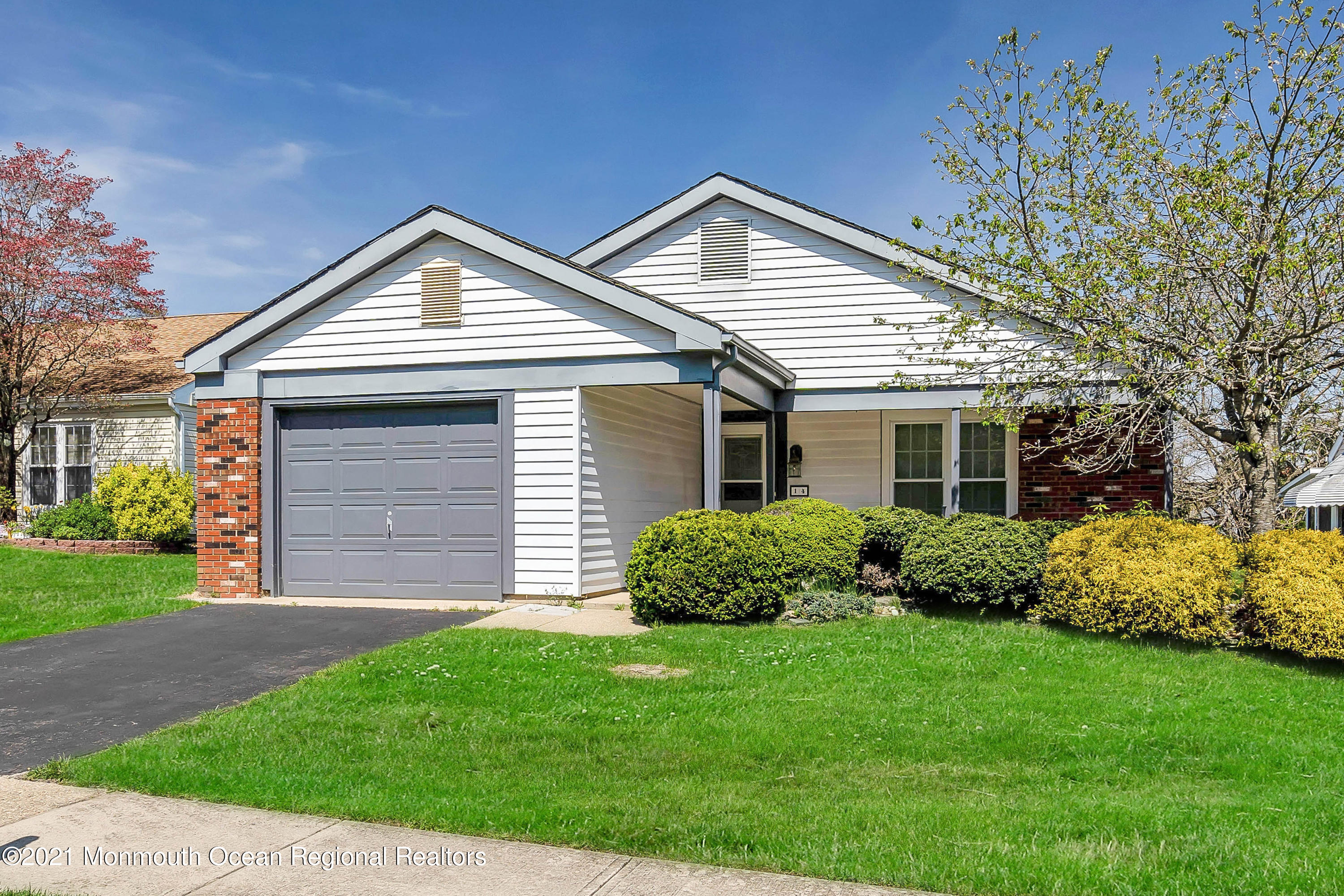 14 Maidstone Way Manchester Township, NJ 08759 - Photo 1 of 49 front view of a house and a yard