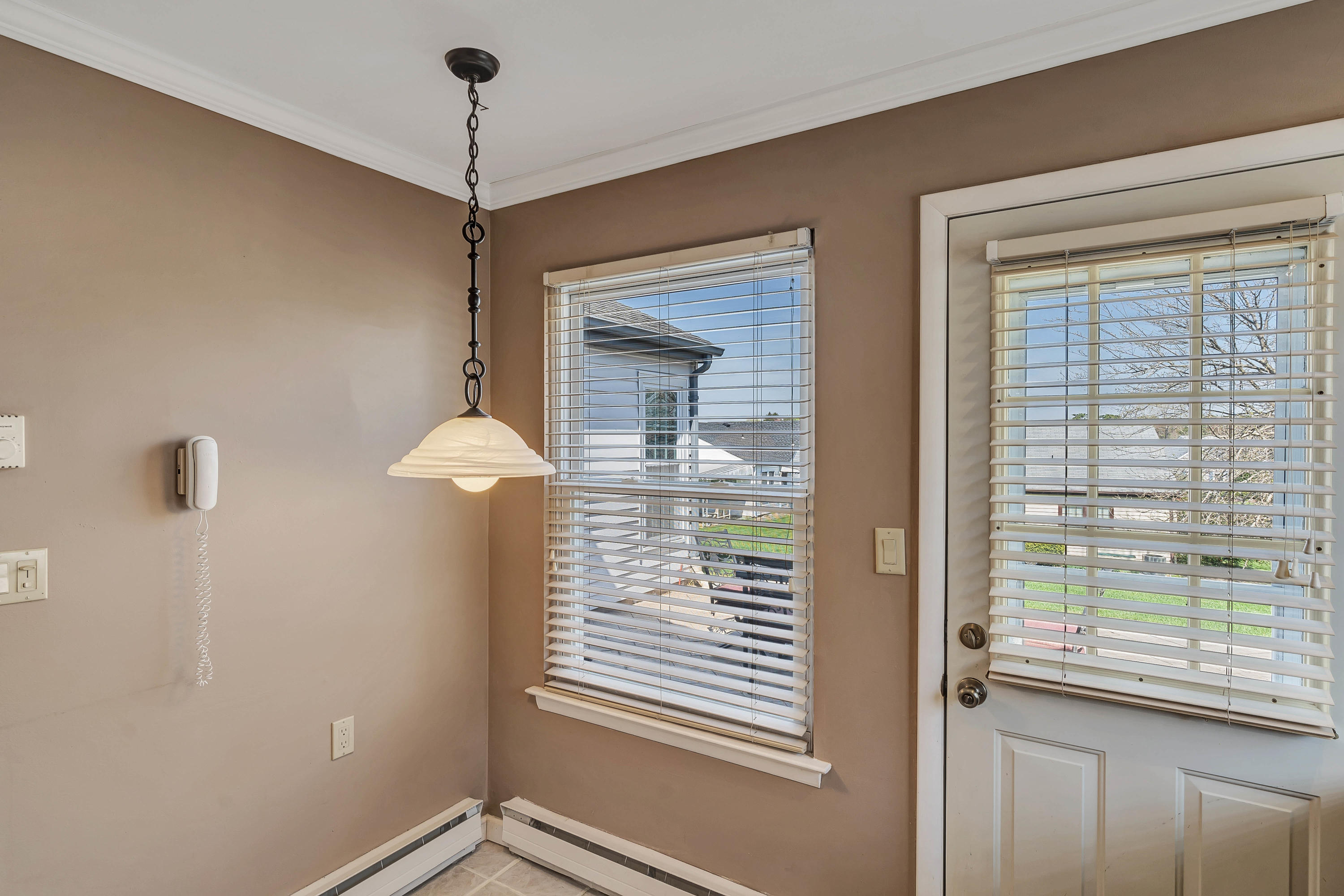 14 Maidstone Way Manchester Township, NJ 08759 - Photo 18 of 49 a view of a hallway with windows and chandelier