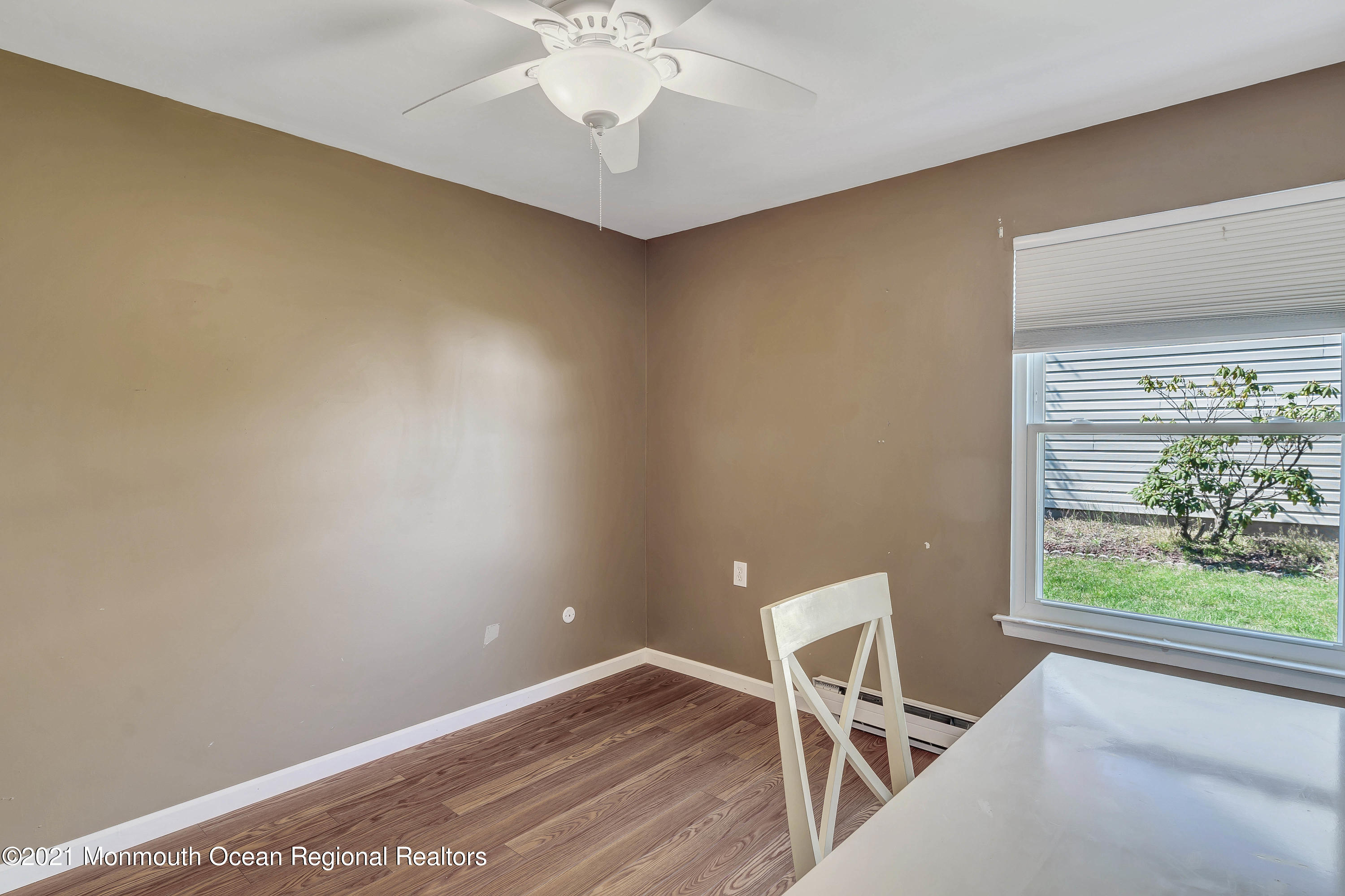 14 Maidstone Way Manchester Township, NJ 08759 - Photo 25 of 49 a view of a room with a window and wooden floor