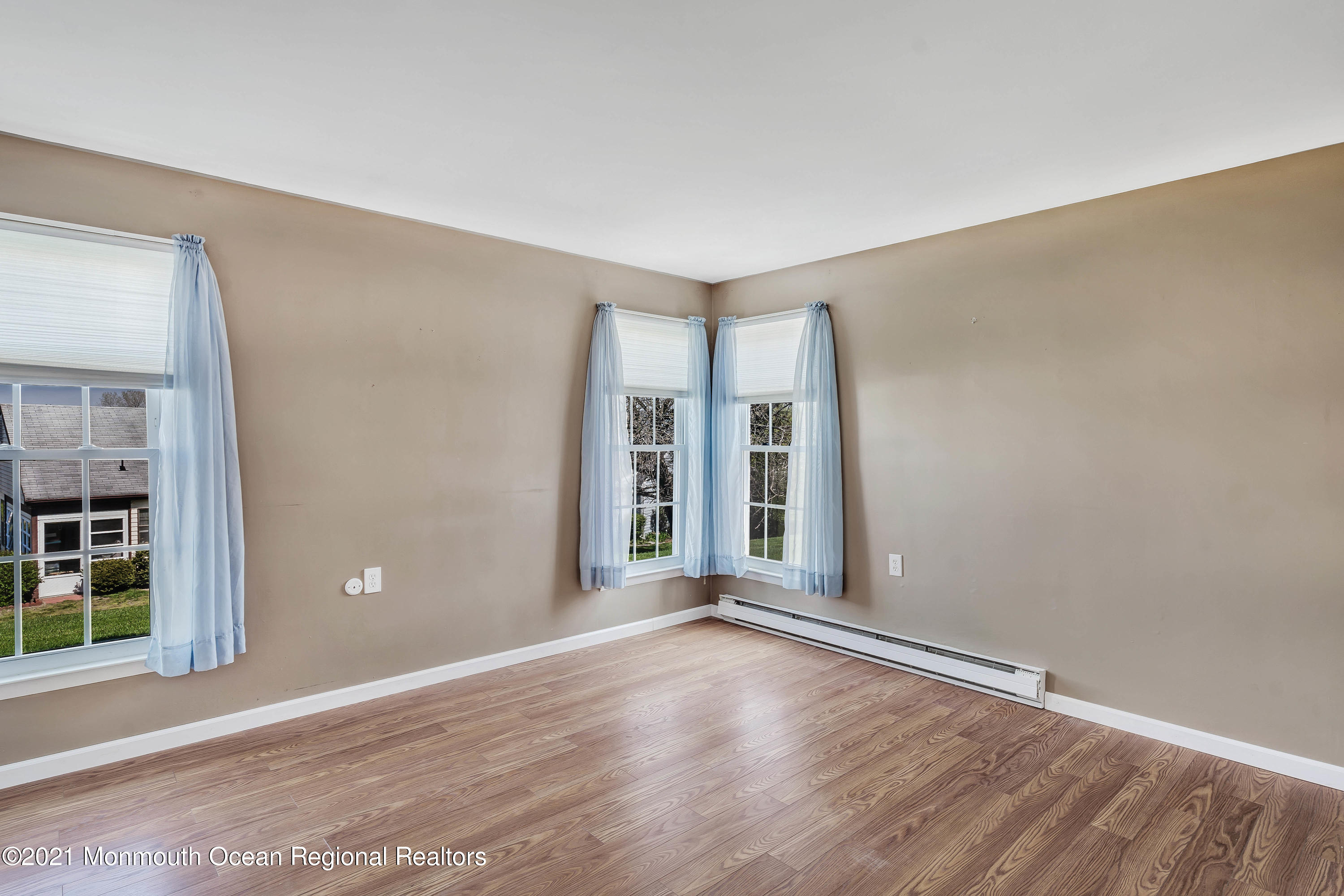 14 Maidstone Way Manchester Township, NJ 08759 - Photo 33 of 49 wooden floor in an empty room with a window