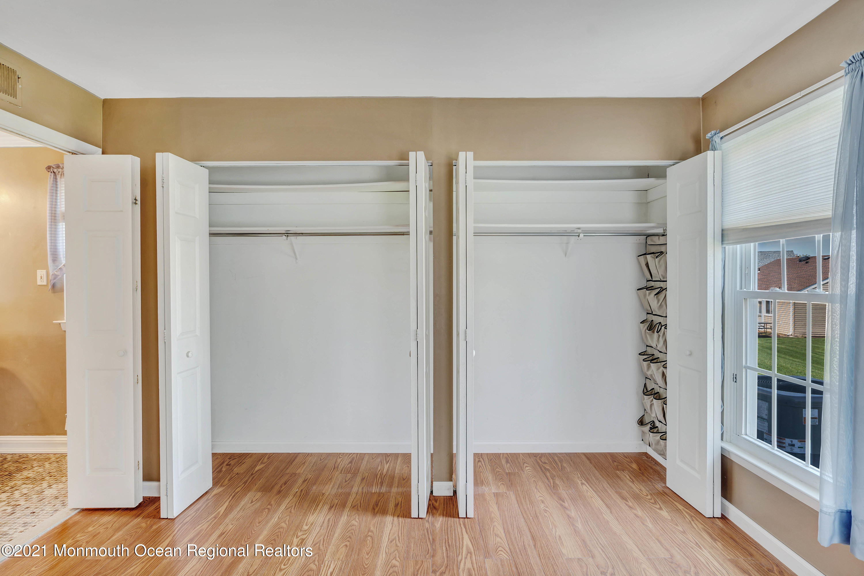 14 Maidstone Way Manchester Township, NJ 08759 - Photo 34 of 49 a view of walk in closet with empty racks