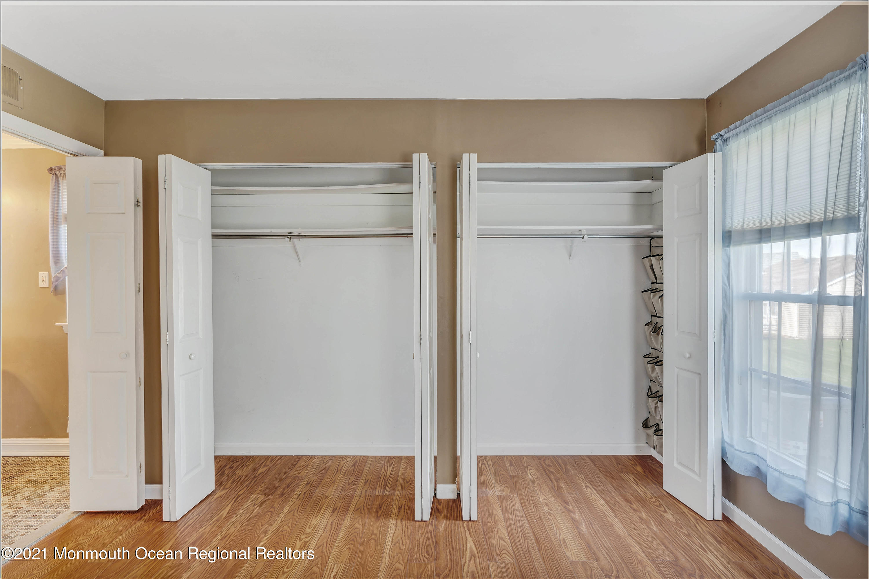 14 Maidstone Way Manchester Township, NJ 08759 - Photo 35 of 49 a view of walk in closet with empty racks