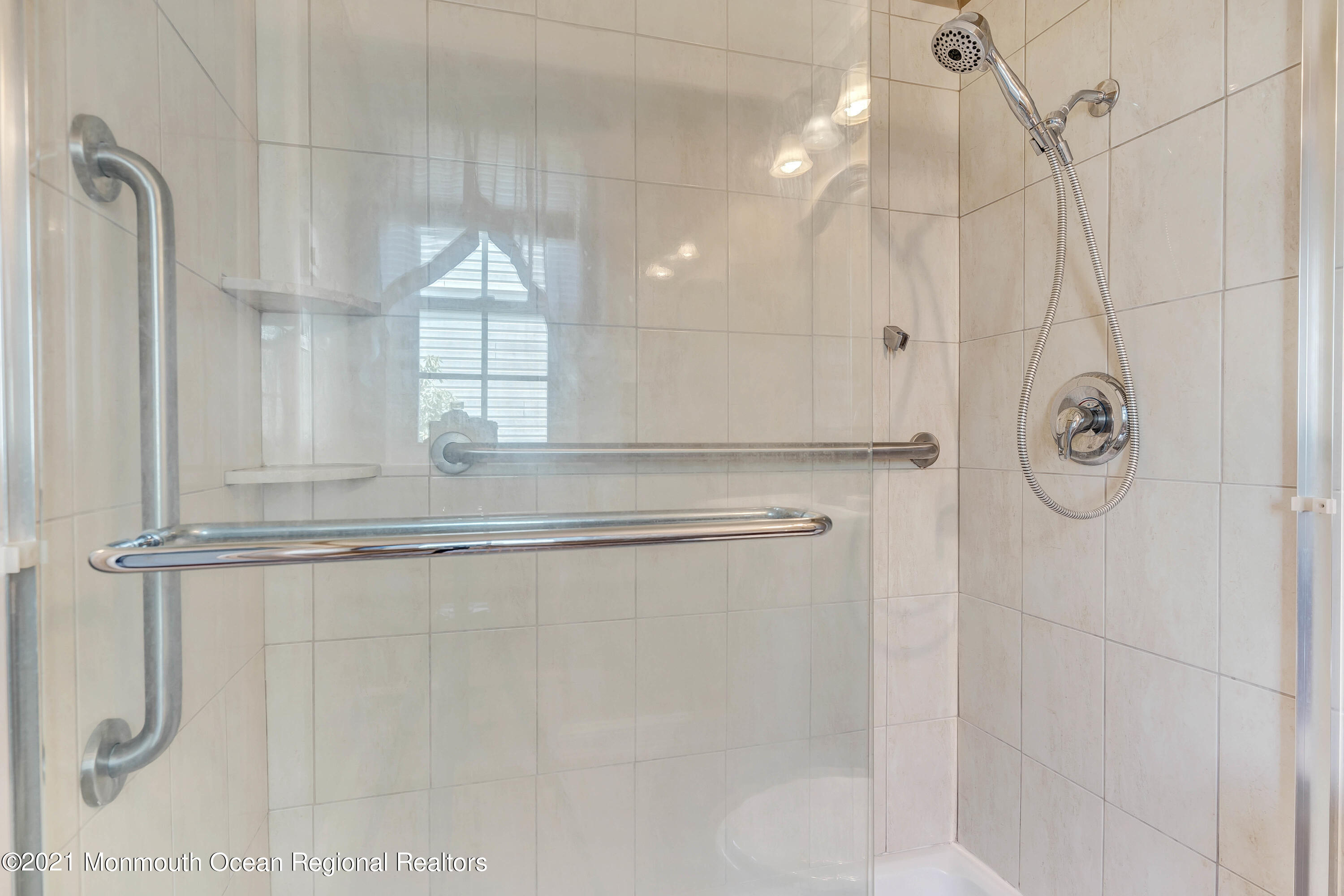 14 Maidstone Way Manchester Township, NJ 08759 - Photo 39 of 49 a bathroom with a shower and a sink
