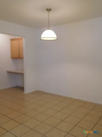 a view of a room with an empty space