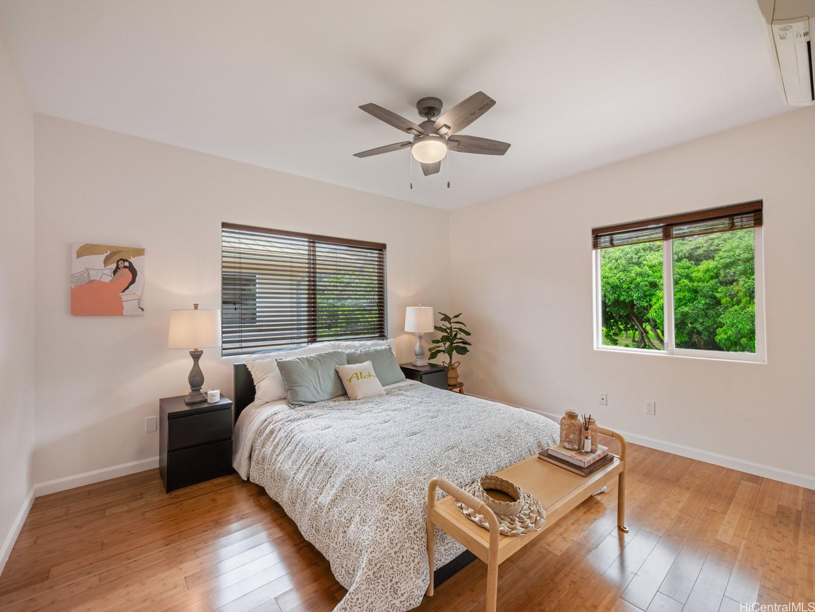 59-355 Ke Nui Road Haleiwa, HI 96712 - Photo 12 of 25 a bedroom with a bed and a window